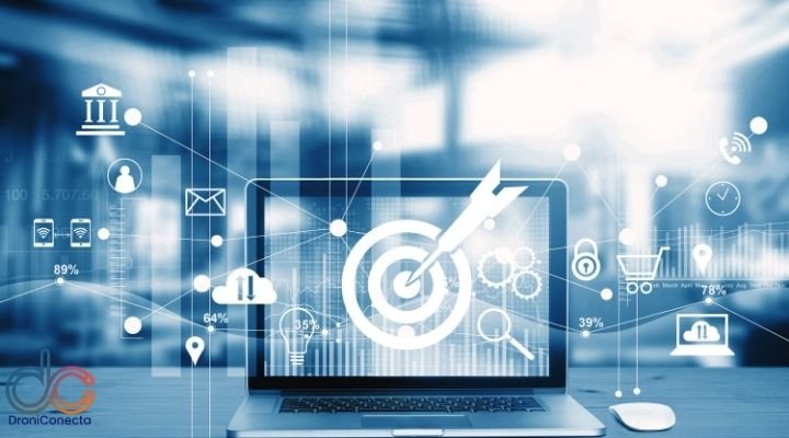 Imagem ilustrativa de um notebook sobre uma mesa com um alvo e uma flexa na tela e o estilo moderno com azul e branco com icones flutuando